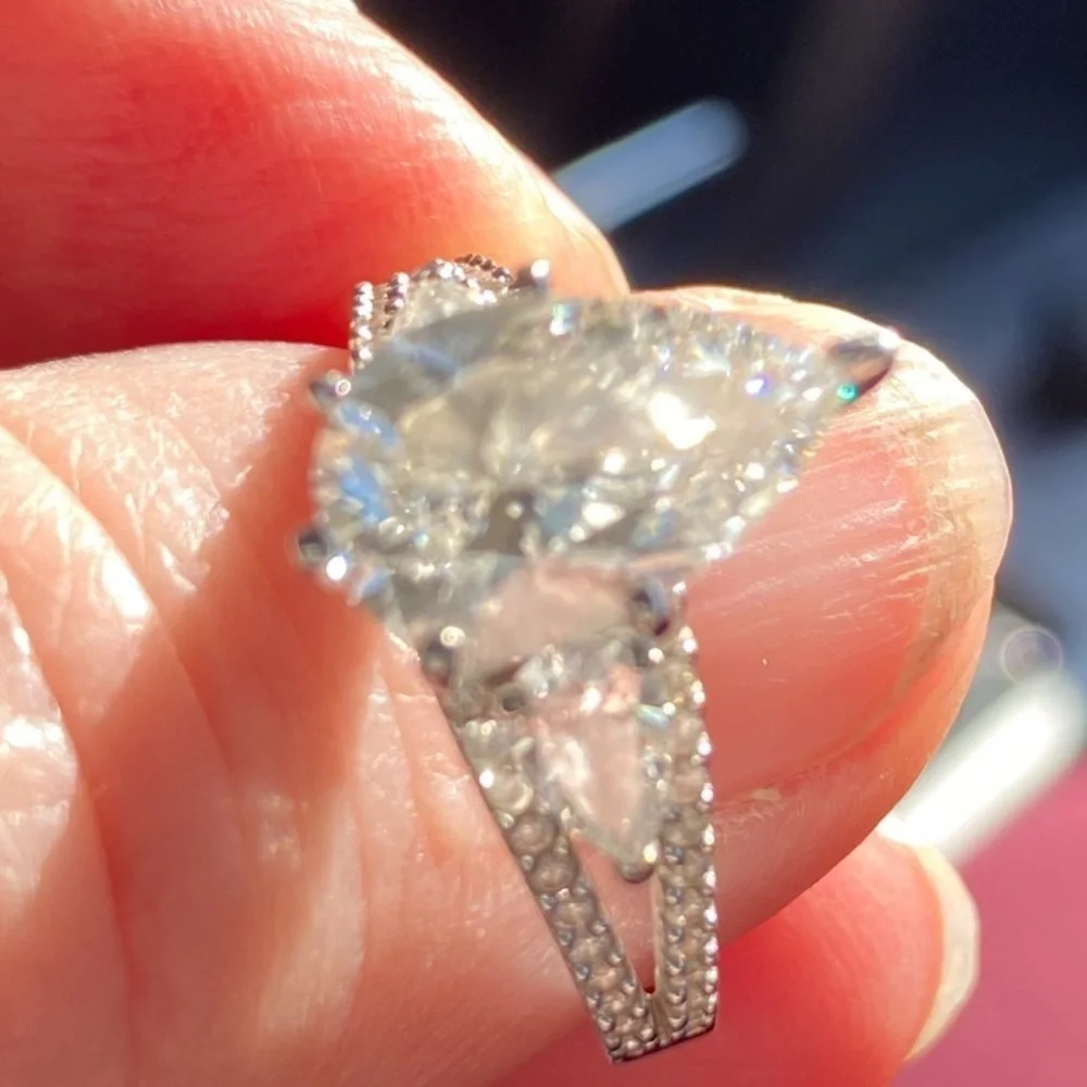 14 karat white gold lab diamond ring.